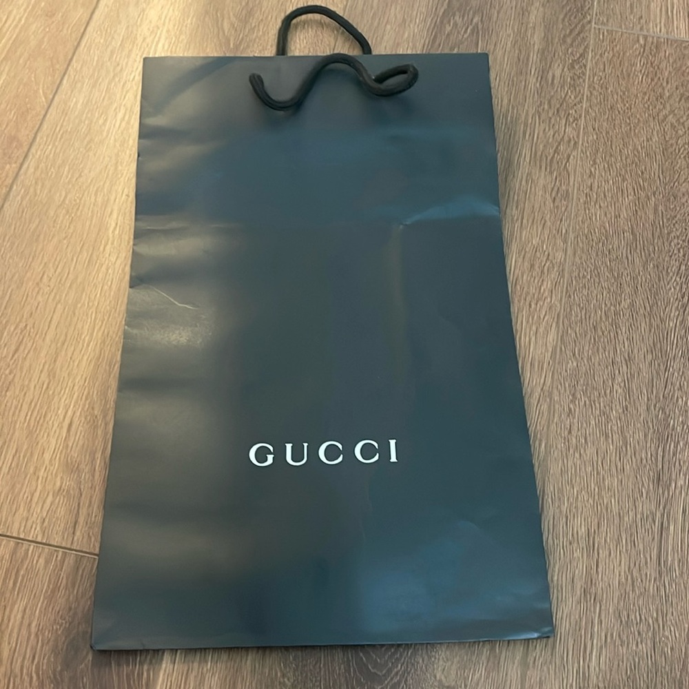 Black GUCCI bag.